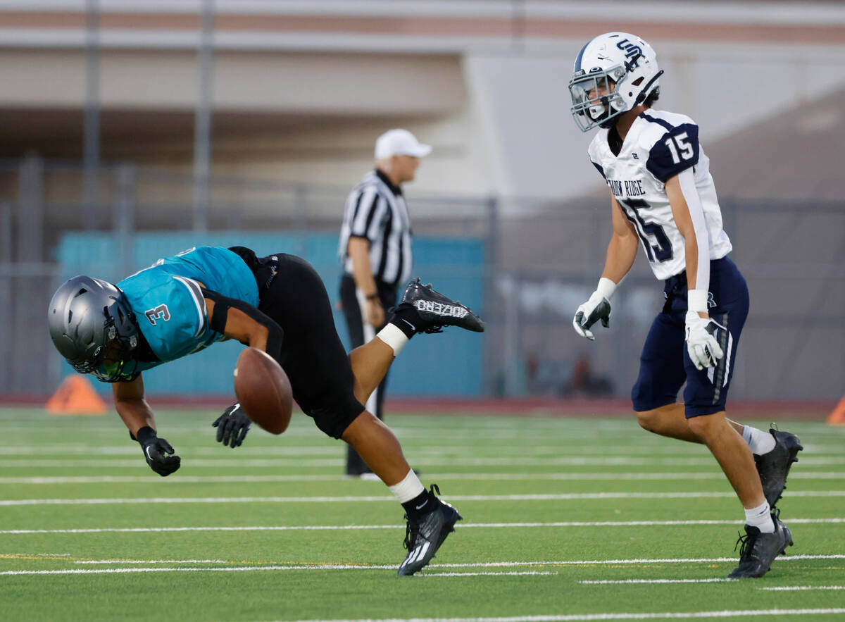 Silverado High Marcus Council (3) misses a pass as Shadow Ridge High Diego Faulkner (15) looks ...