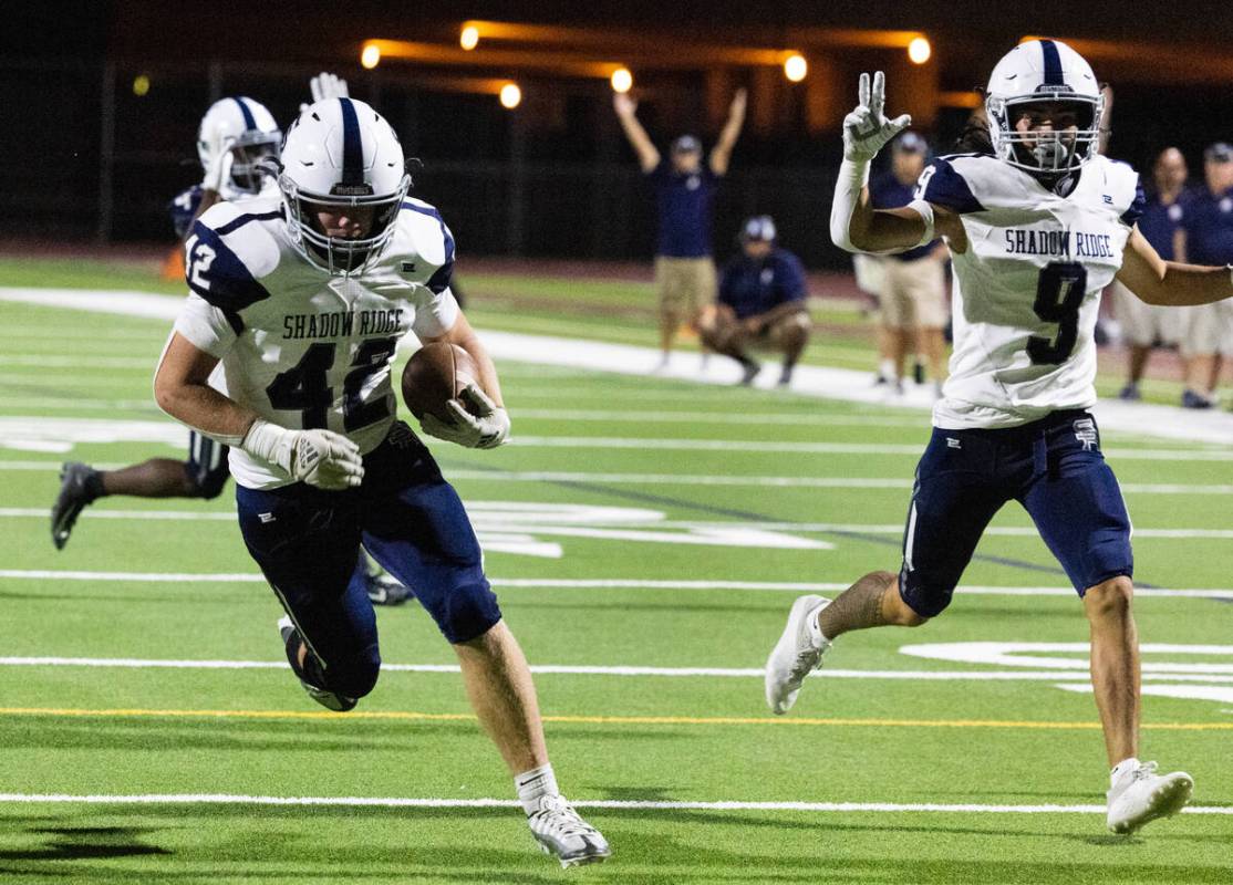 Shadow Ridge High Evan Cannon (42) scores a touchdown against Silverado High during the first h ...