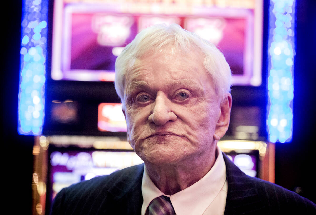 Don Laughlin, owner of the Riverside Casino, sits near a bank of slot machines during the 50th ...
