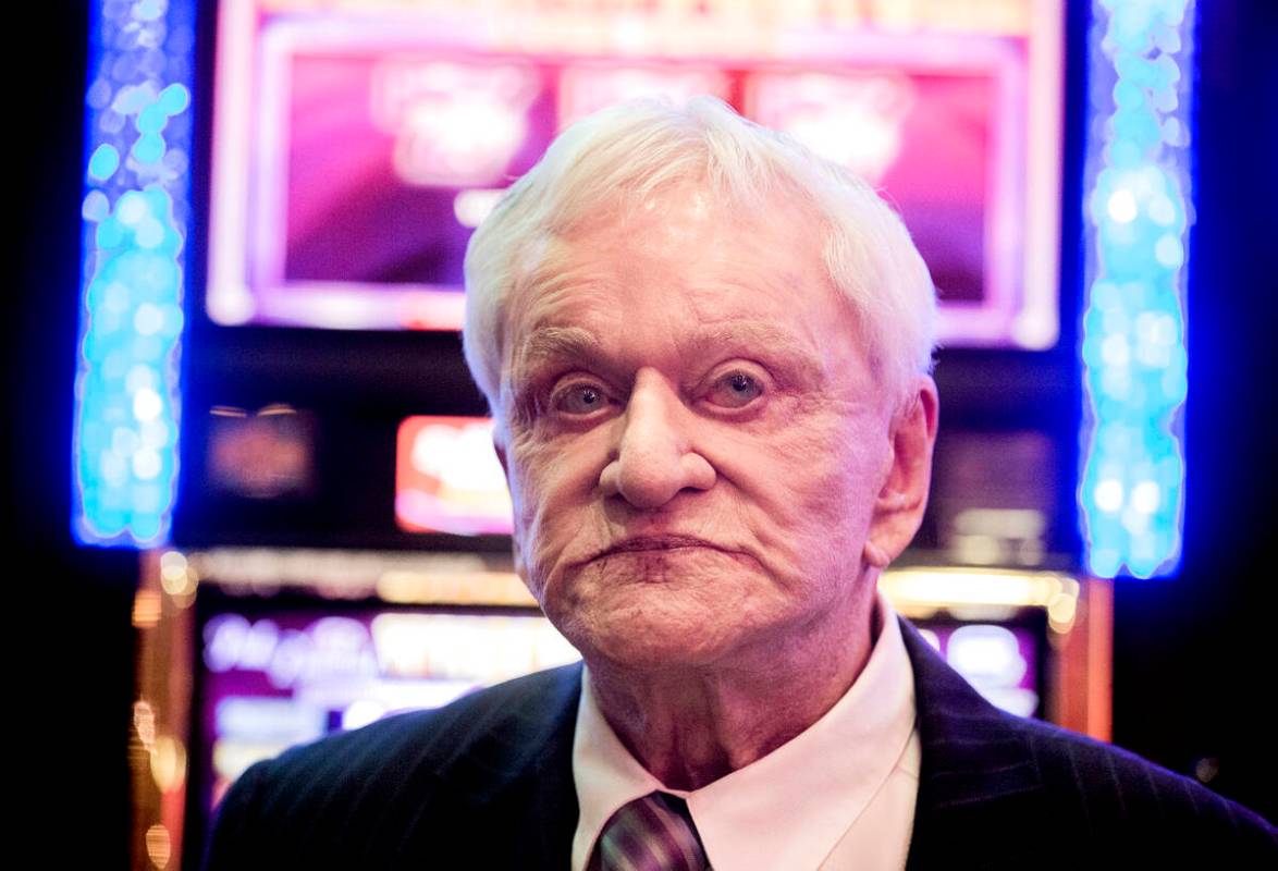 Don Laughlin, owner of the Riverside Casino, sits near a bank of slot machines during the 50th ...