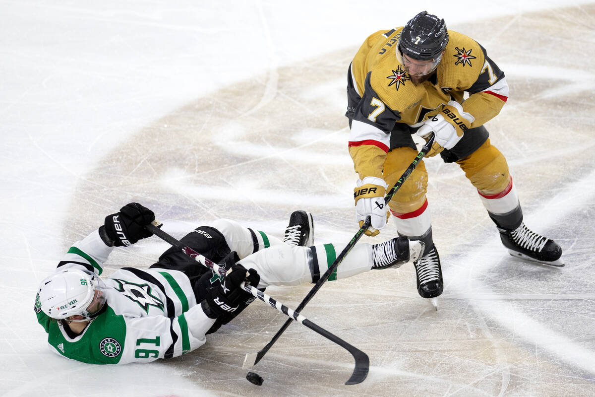 Golden Knights defenseman Alex Pietrangelo (7) and Dallas Stars center Tyler Seguin (91) battle ...