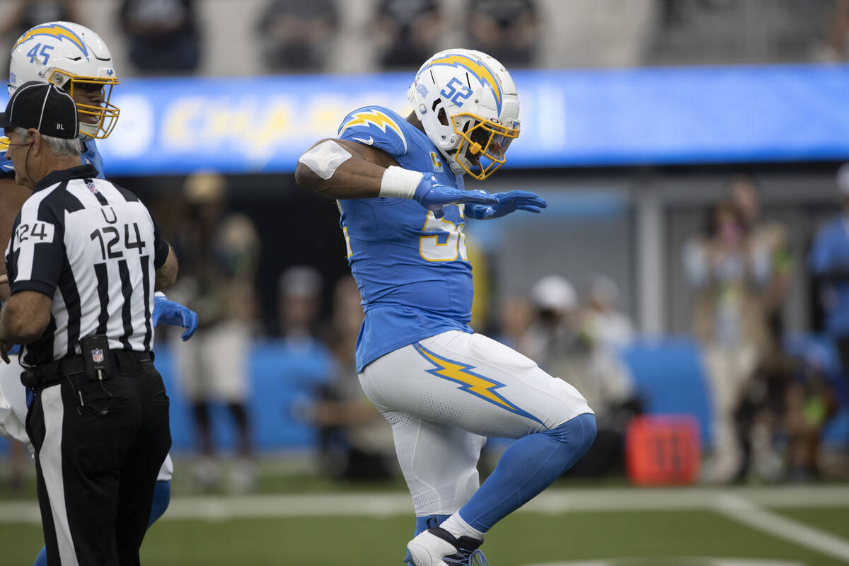 Los Angeles Chargers linebacker Khalil Mack (52) celebrates his sack of Raiders quarterback Aid ...