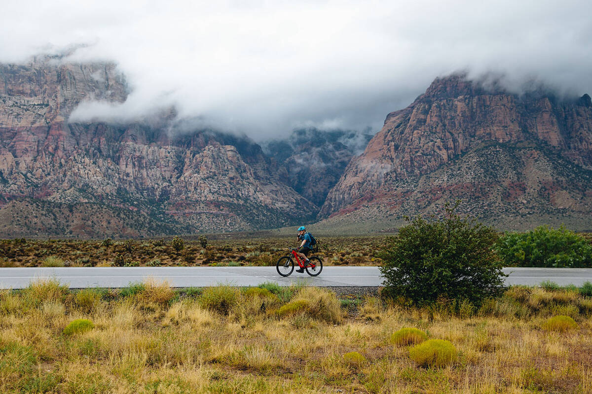 Brian Lee bikes on the Scenic Loop Drive path, which was closed to visitors due to impending st ...