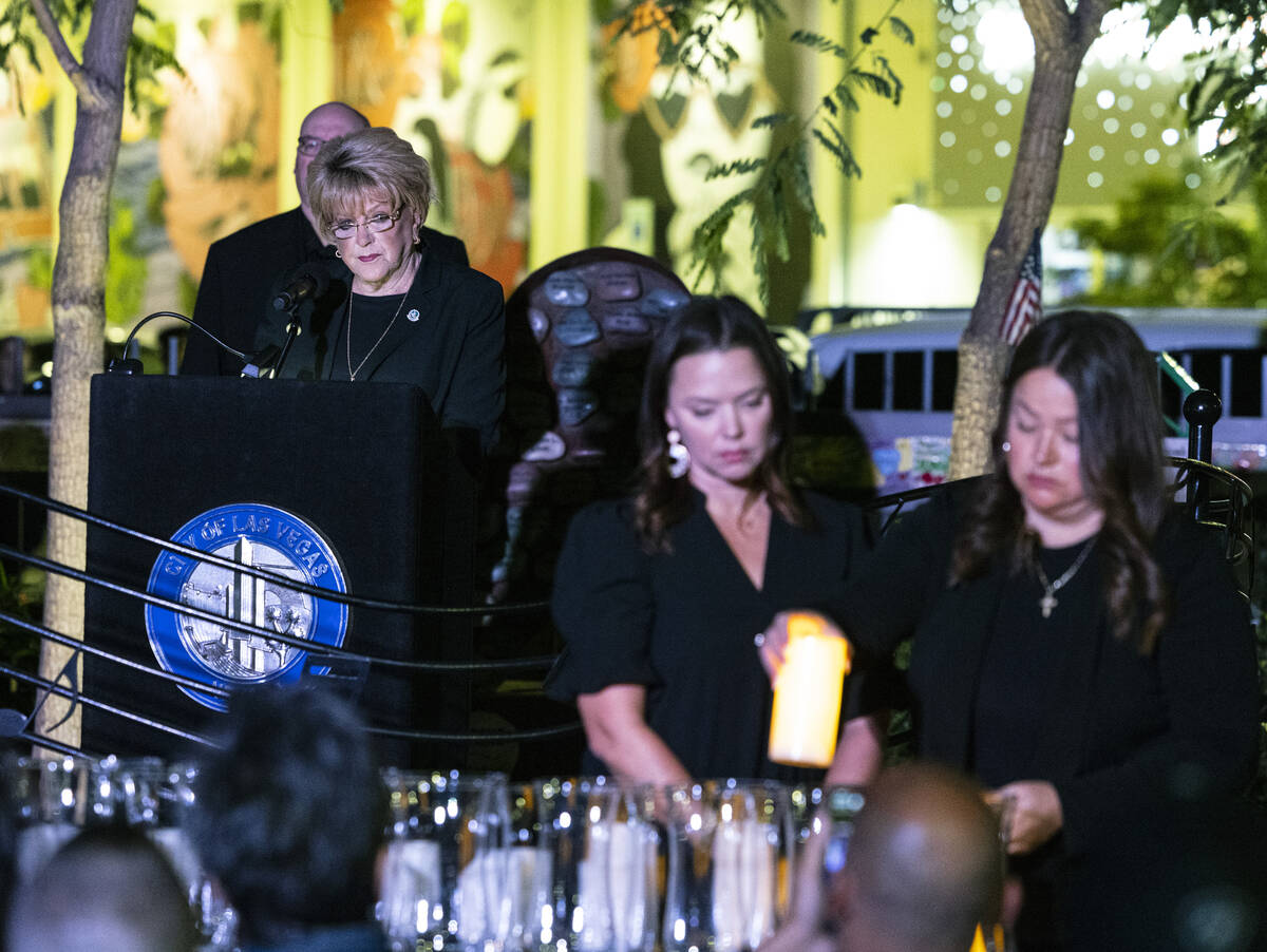 Candles are lit as Mayor Carolyn Goodman reads the names of the 1 October victims, during a mem ...