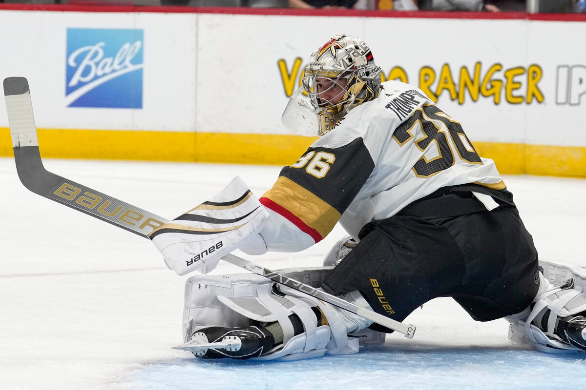 Vegas Golden Knights goalie Logan Thompson looks for a shot by the Colorado Avalanche in the fi ...