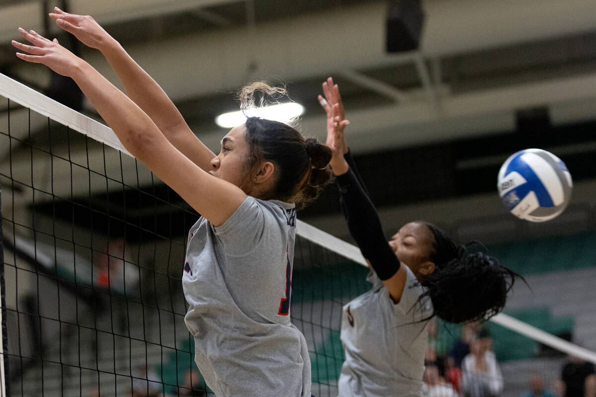 A Palo Verde hit gets past Liberty’s Tehani Moniz, left, and Kennedy Cooper during a hig ...