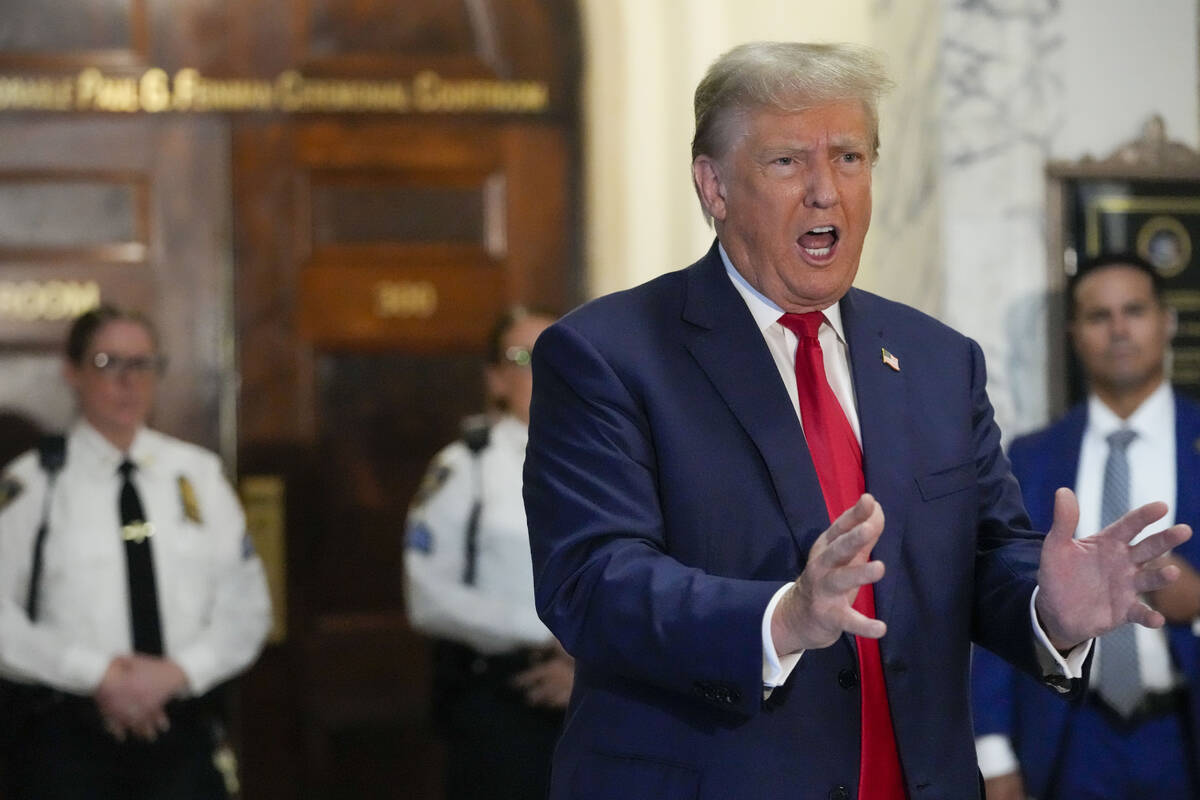 Former President Donald Trump speaks to the media before entering the courtroom at New York Sup ...