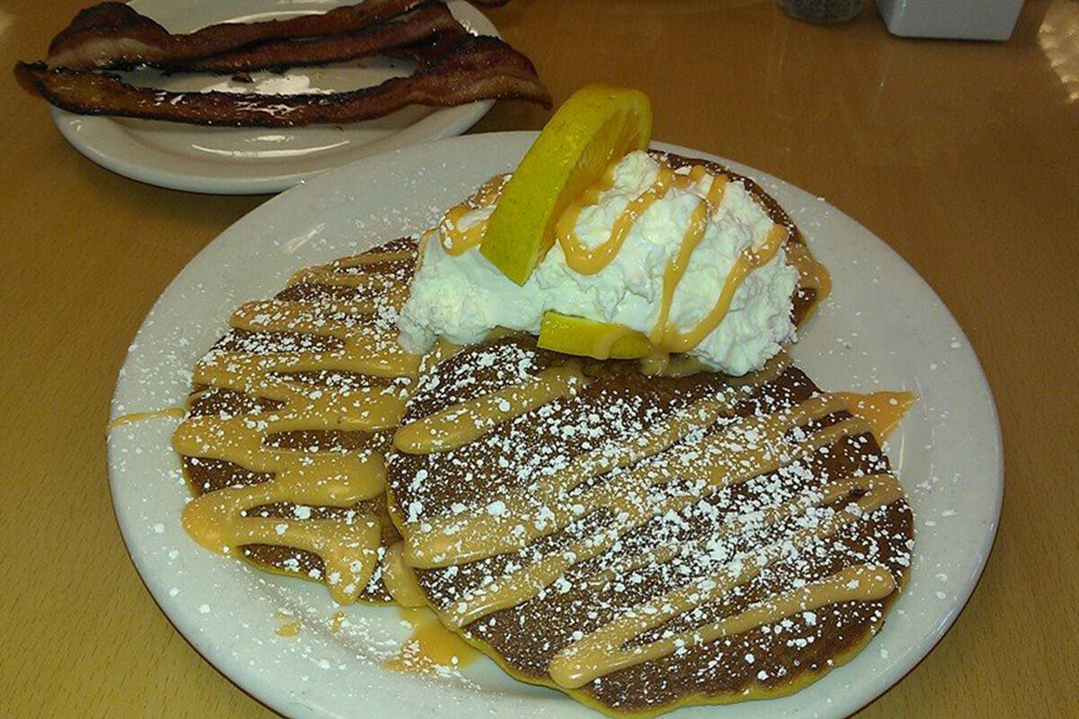 The Orange Creamsicle pancakes at BabyStacks Cafe (shown here as a short stack) are served with ...