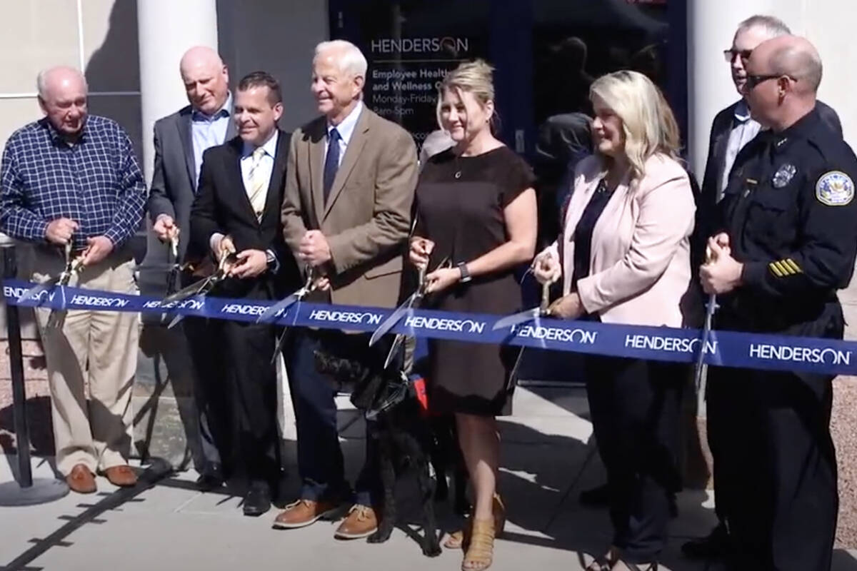 Henderson Mayor Michelle Romero, third from right, leads a ribbon-cutting ceremony for the city ...