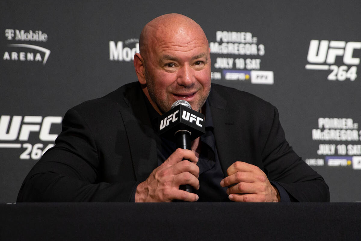 UFC president Dana White answers questions during a post-fight news conference at UFC 264 at th ...