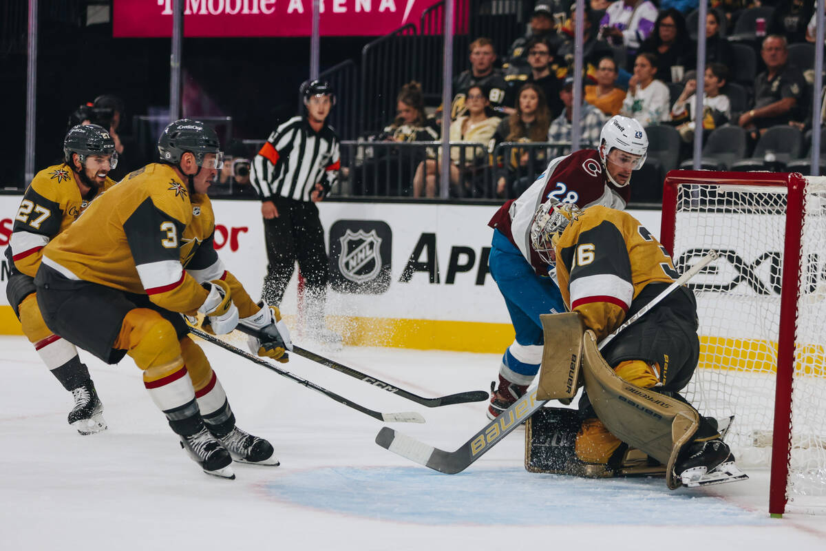 Golden Knights goaltender Logan Thompson (36) blocks a a shot during a game against the Colorad ...