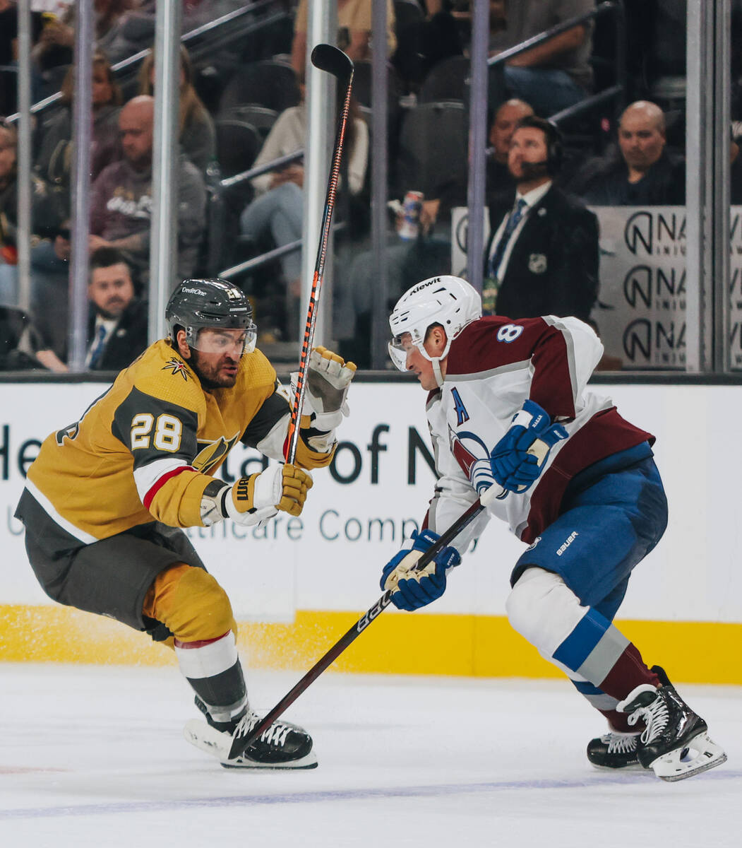 Golden Knights left wing William Carrier (28) skates after Colorado Avalanche defenseman Cale M ...