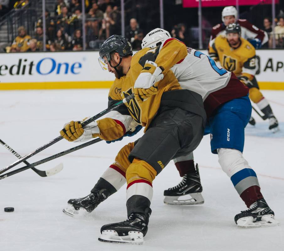 Golden Knights center Nicolas Roy (10) shuffles the puck during a game against the Colorado Ava ...