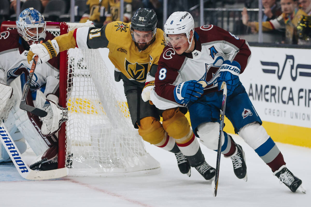 Golden Knights captain Mark Stone (61) chases after Colorado Avalanche defenseman Cale Makar (8 ...