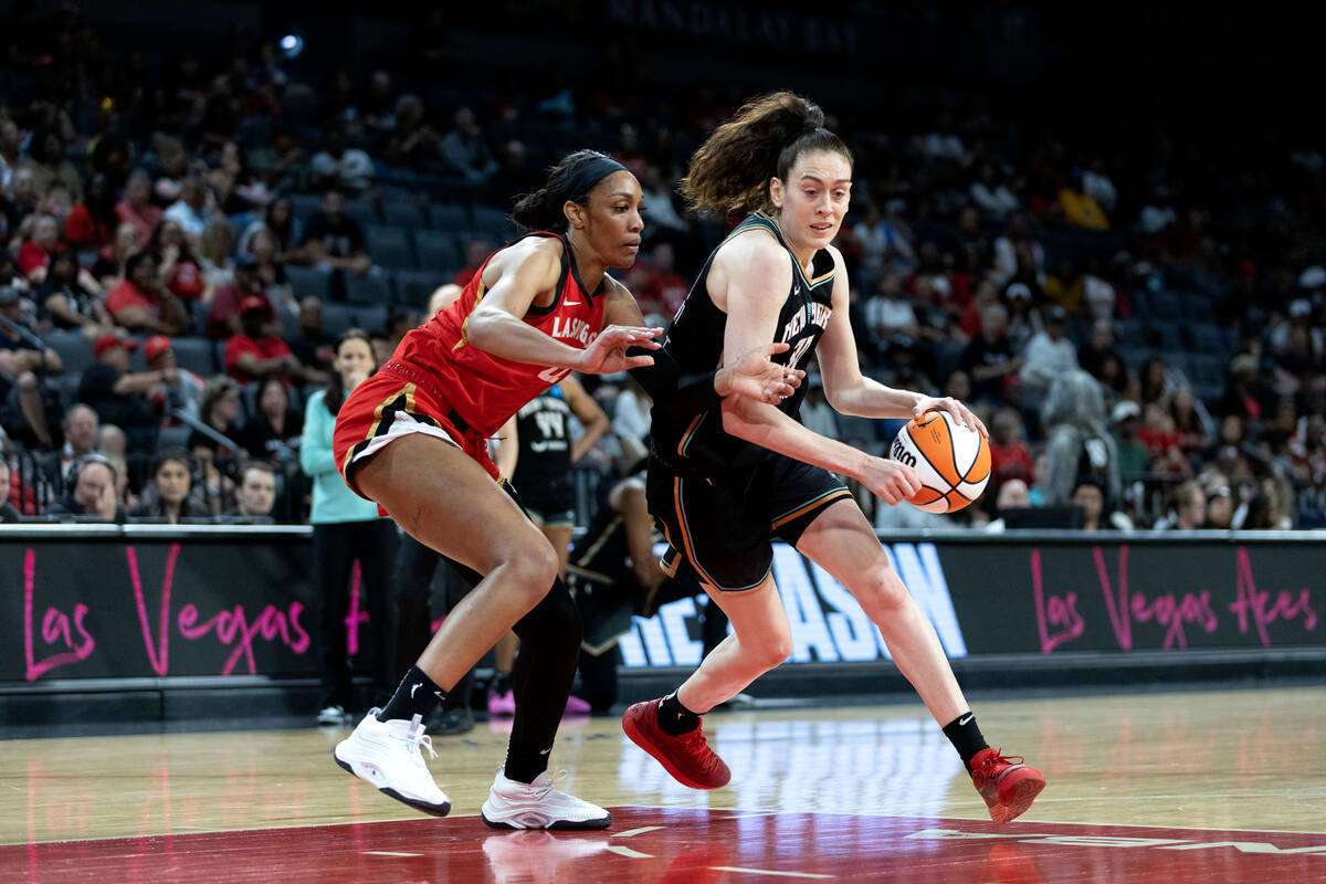 Las Vegas Aces forward A'ja Wilson (22) guards New York Liberty forward Breanna Stewart (30) du ...