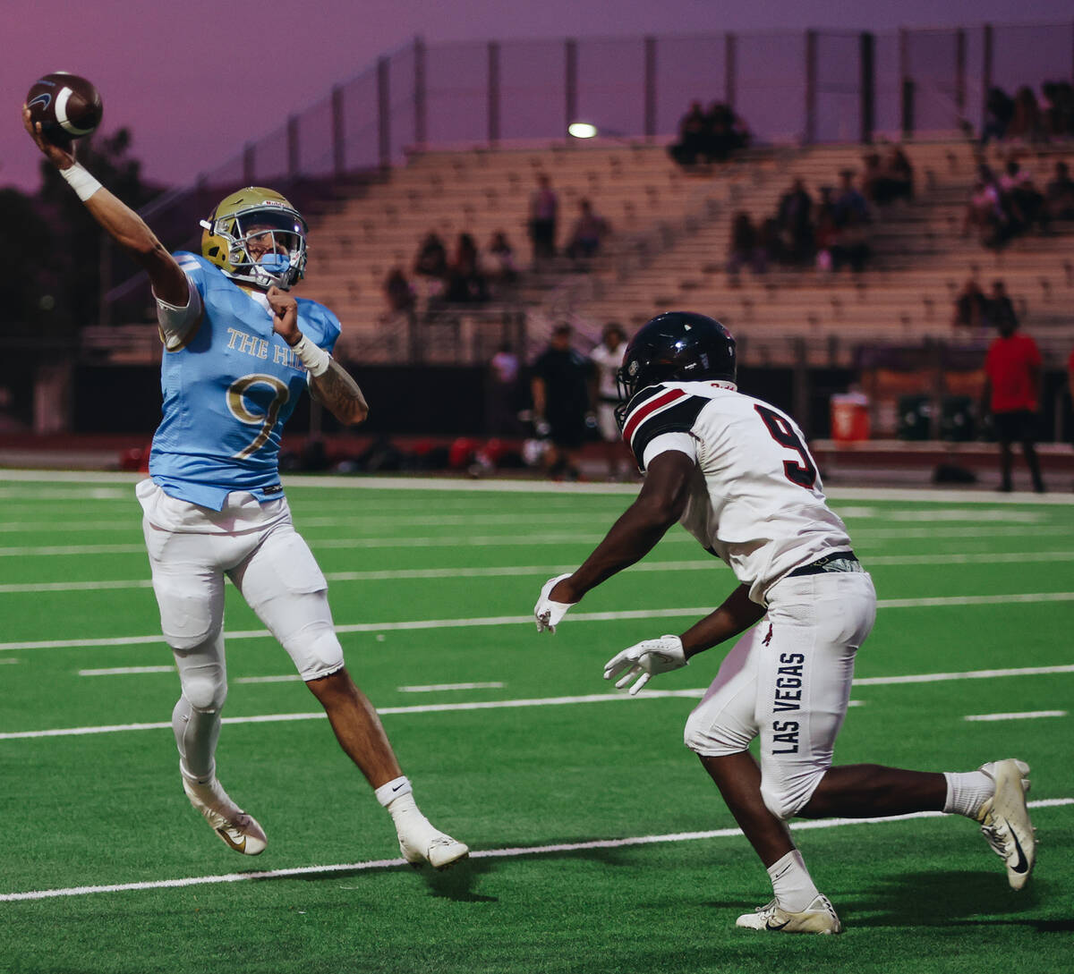 Foothill quarterback Mason Dew (left) throws the ball as Las Vegas offensive linebacker Christo ...