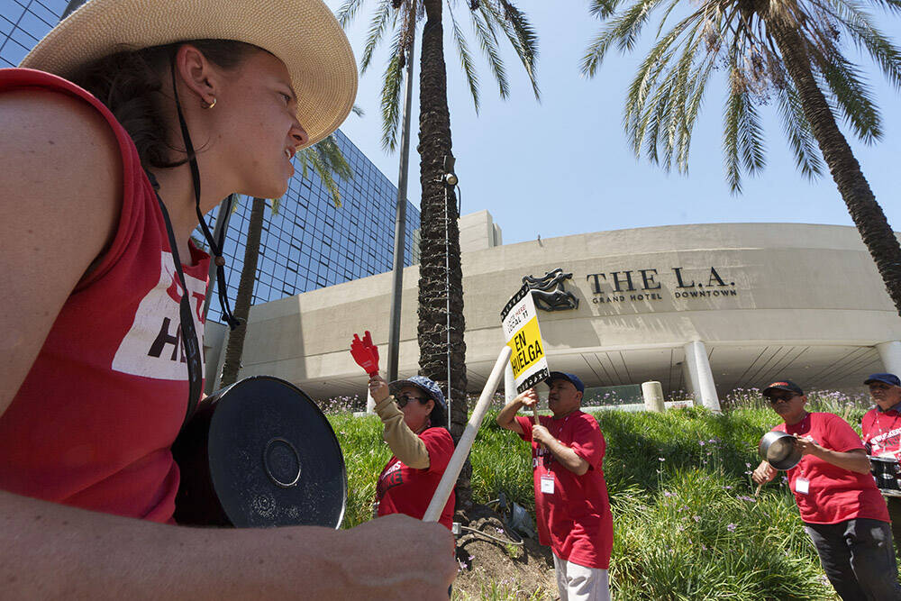 Striking hotel workers rally outside The L.A. Grand Hotel Downtown on Tuesday, July 4, 2023, in ...