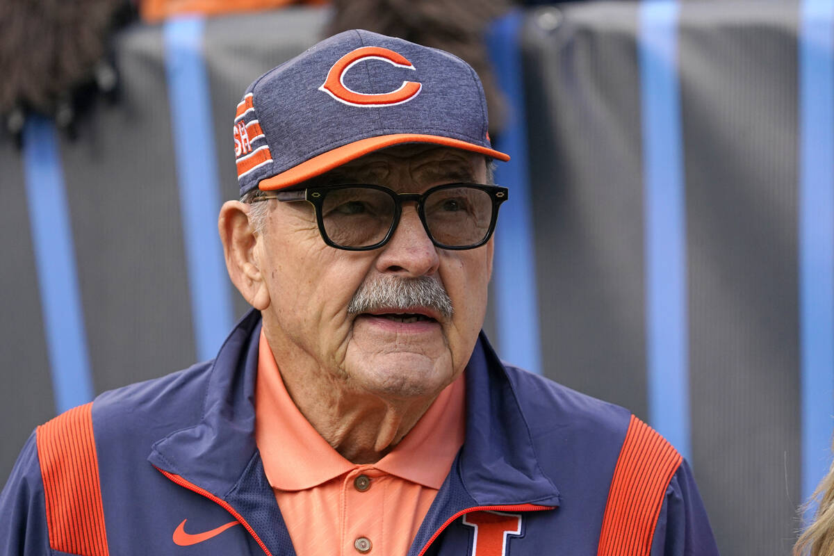 Chicago Bears great Dick Butkus watches from the sideline during the first half of the team's N ...