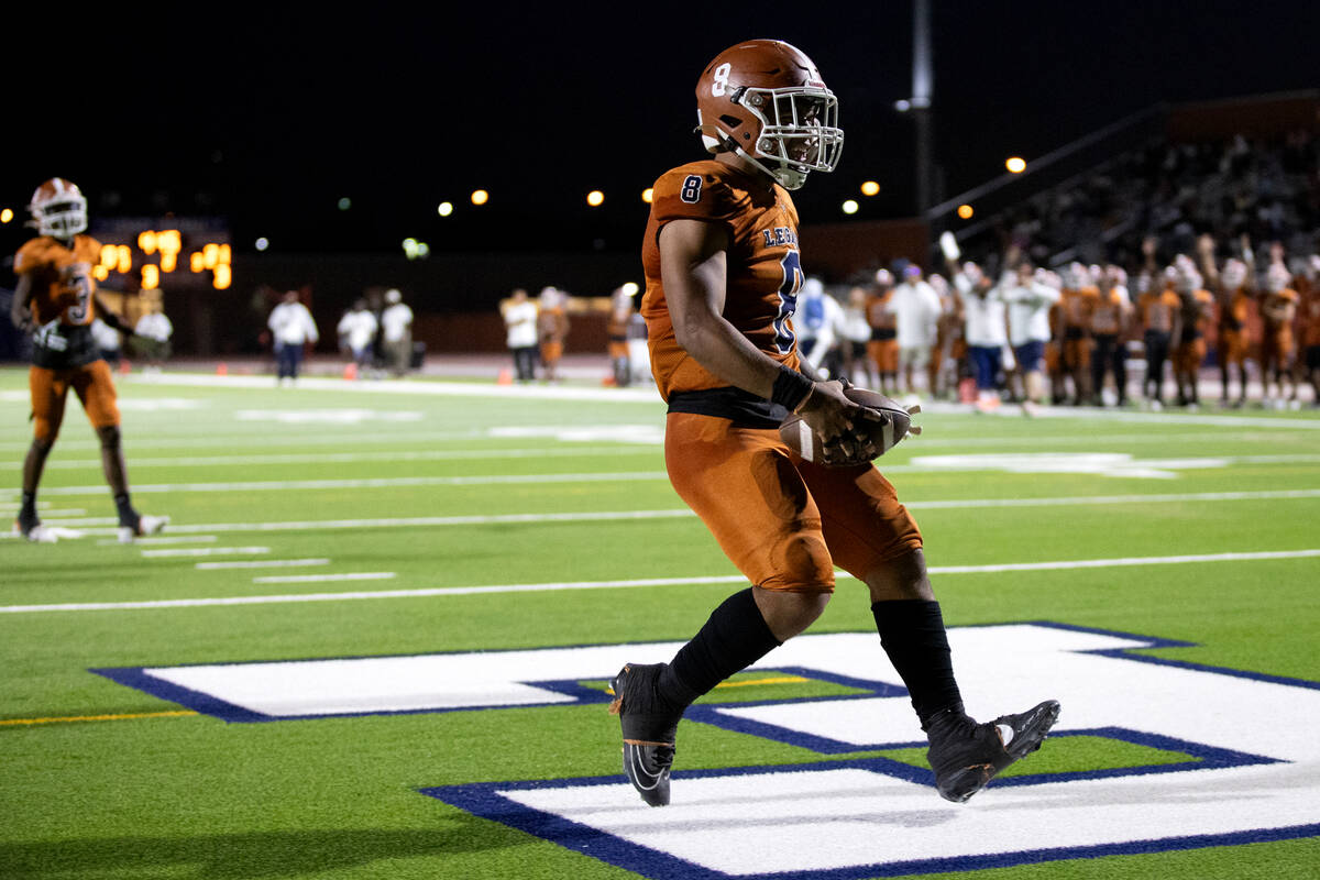 Legacy running back Phoenix Jennings (8) celebrates as he scores a touchdown during a high scho ...