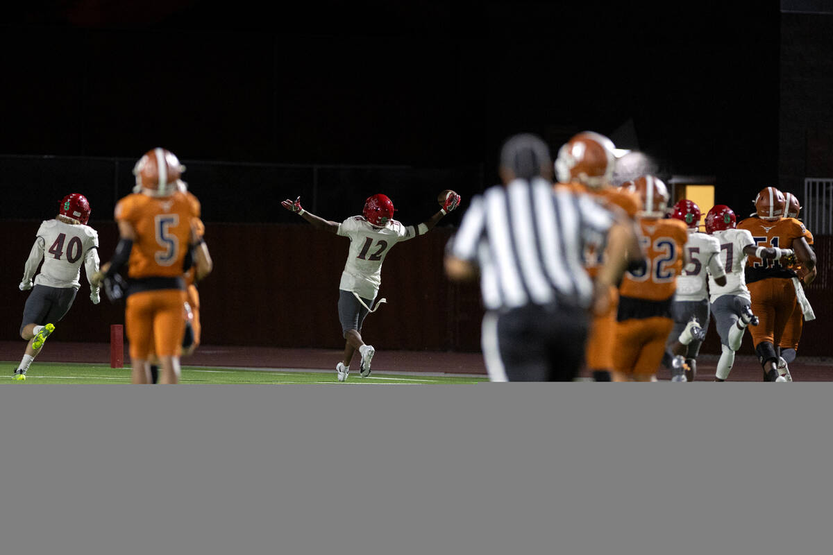 Arbor View wide receiver Damien Dixon Jr. (12) runs into the end zone for a touchdown after int ...