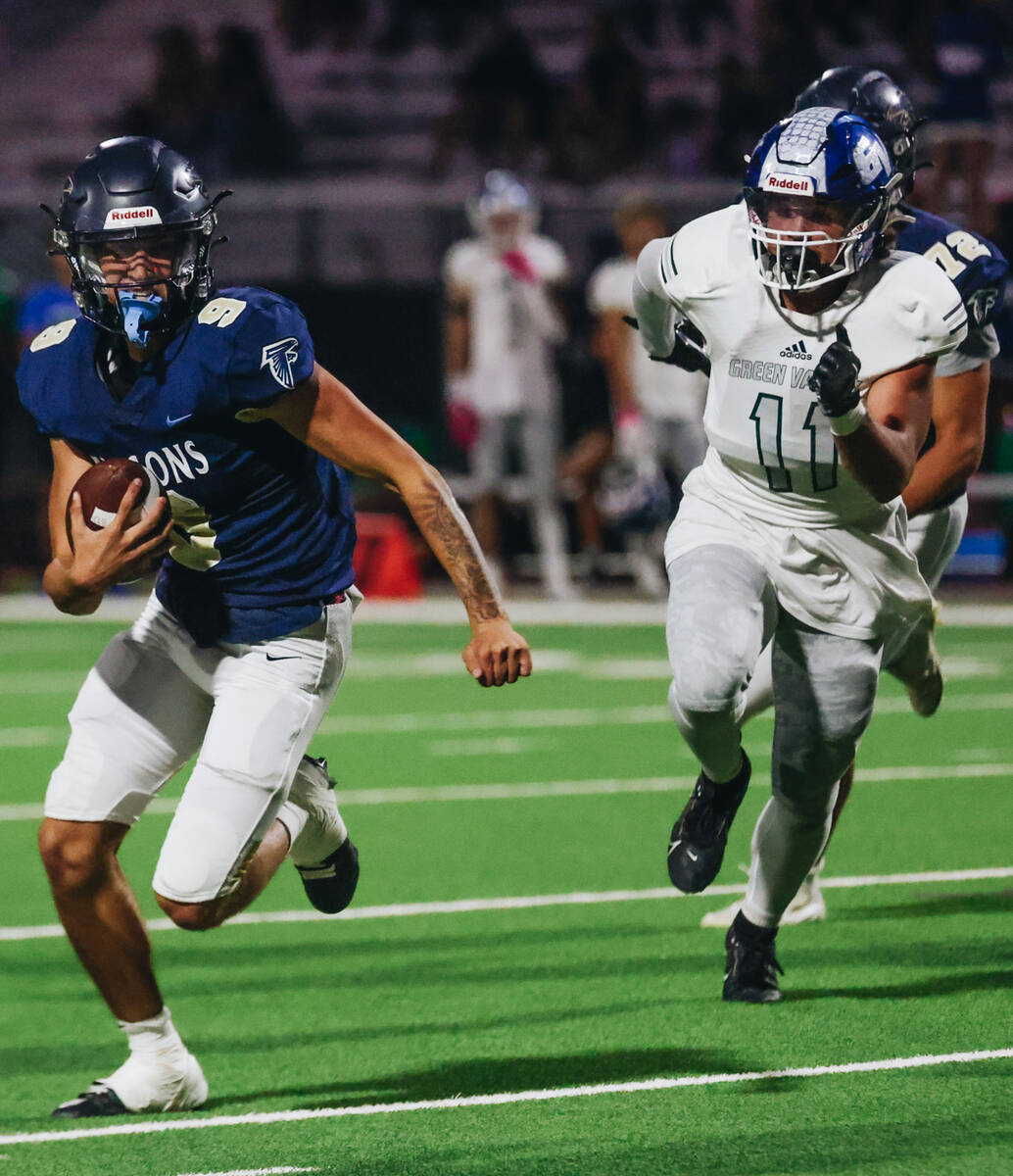 Foothill quarterback Mason Dew (9) runs with the ball during a game against Green Valley at Foo ...