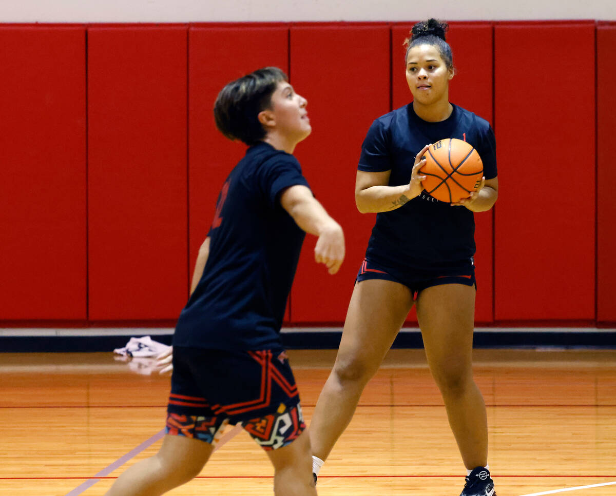 UNLV Lady Rebels forward Nneka Obiazor (1) prepares to shoot as Alyssa Durazo-Frescas (12) watc ...