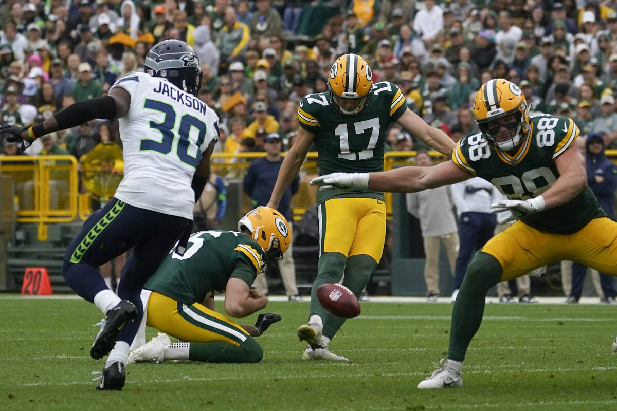 Green Bay Packers place-kicker Anders Carlson (17) kicks a 43-yard field goal in the first half ...