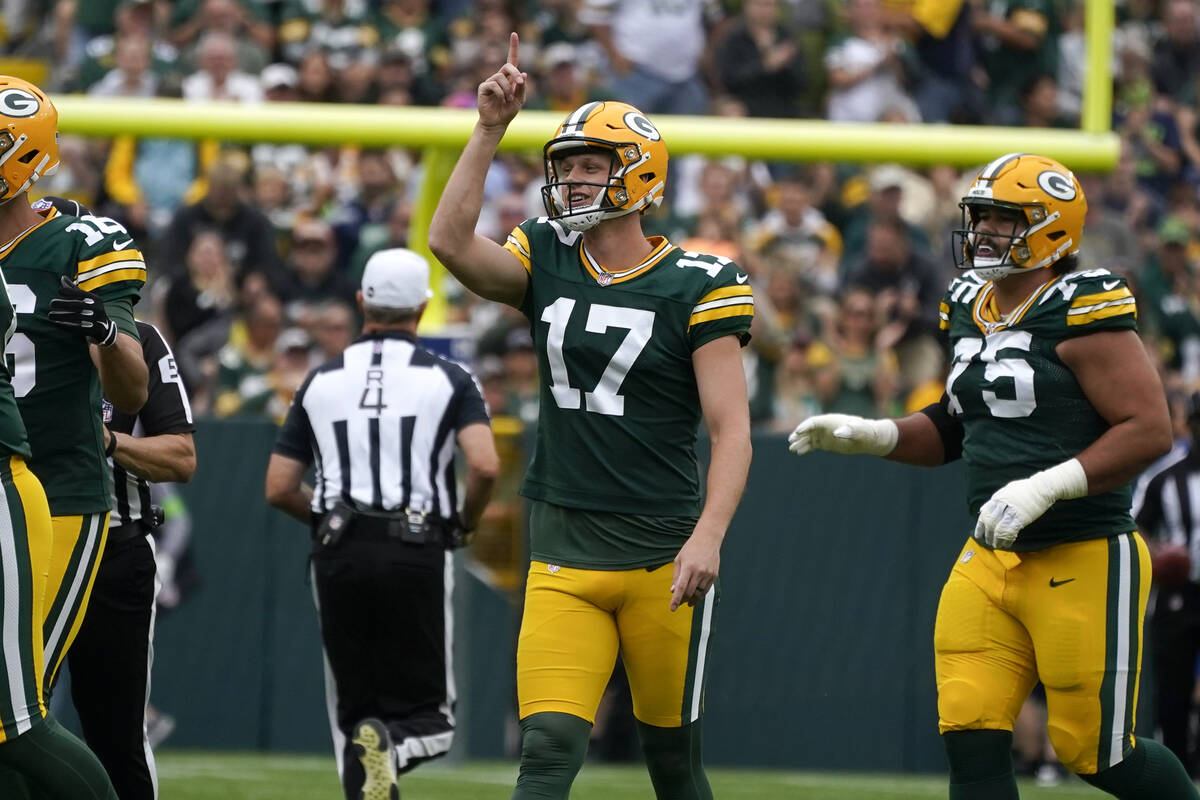 Green Bay Packers place-kicker Anders Carlson (17) celebrates after kicking a 57-yard field goa ...