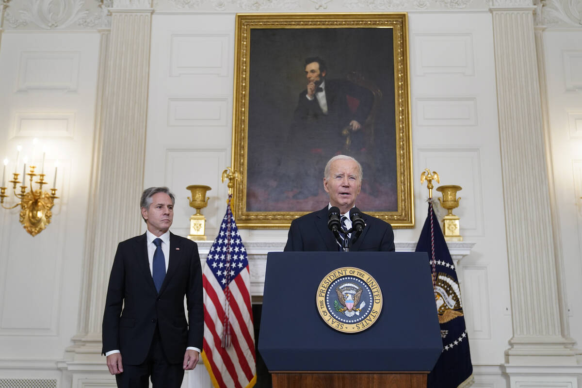 President Joe Biden speaks in the State Dining Room of the White House, Saturday, Oct. 7, 2023, ...