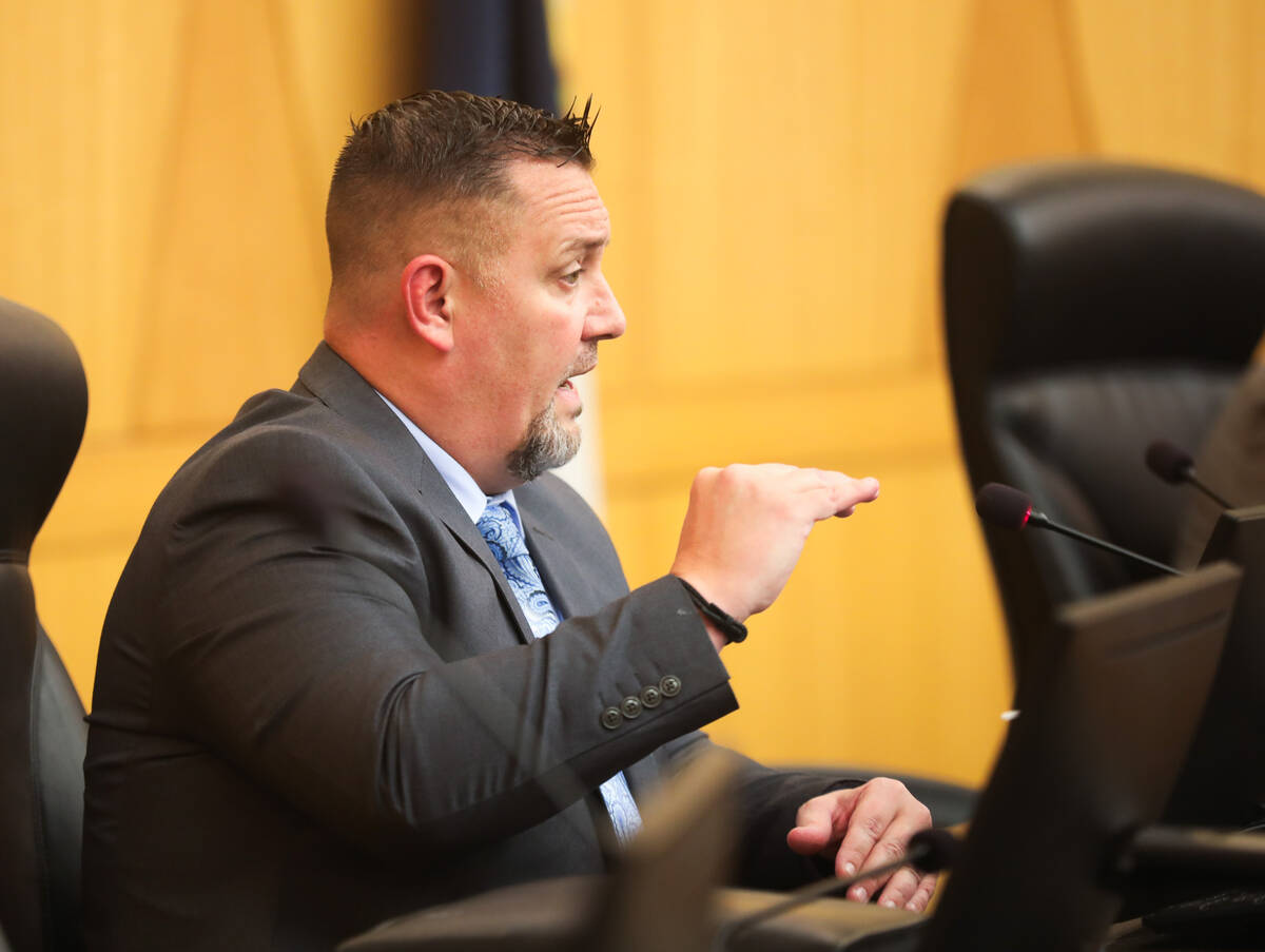 Detective Aaron Snyder, with the North Las Vegas Police Department, goes over details of the fa ...