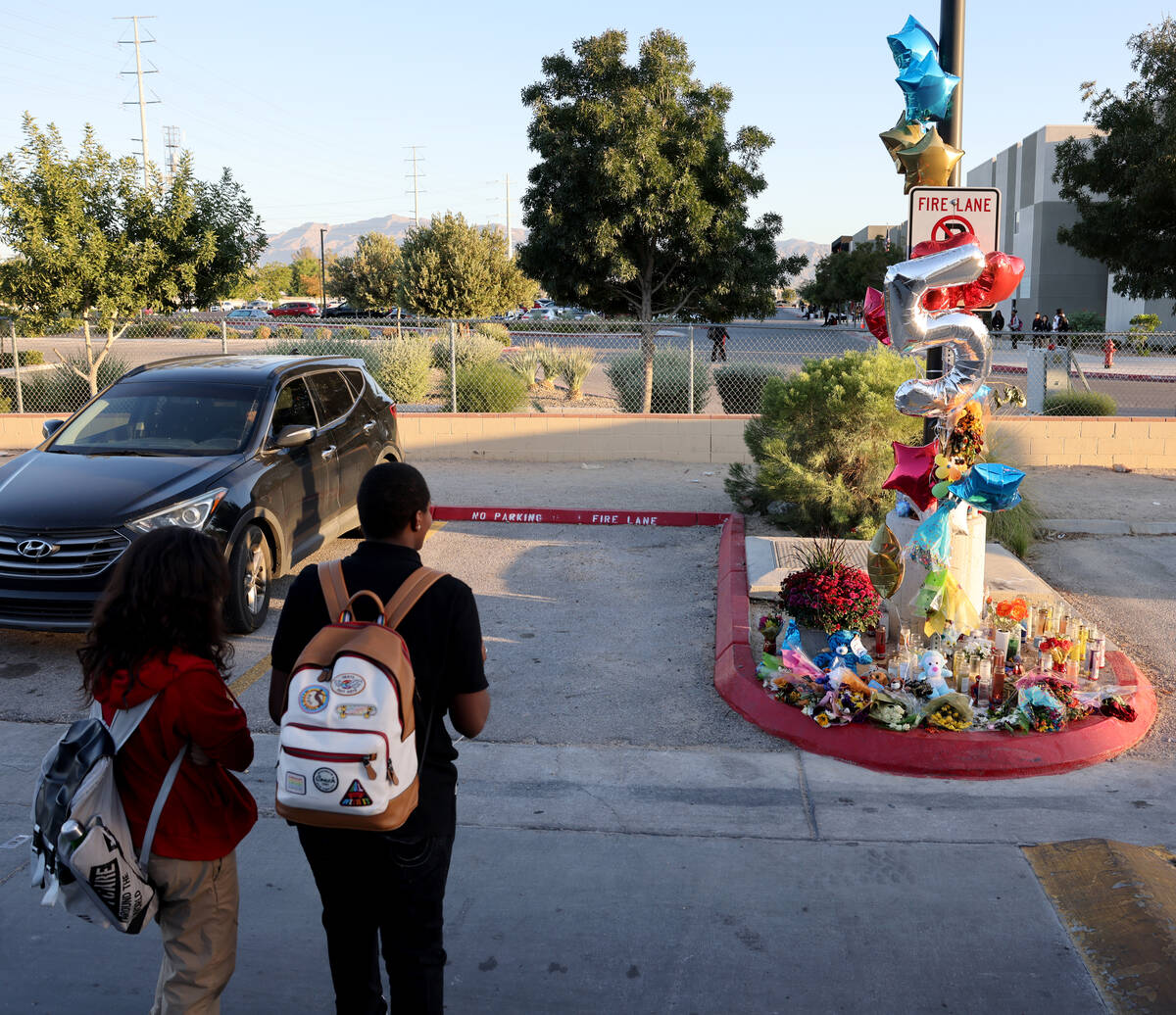 Students pause on their way school at Somerset Academy’s Losee campus in North Las Vegas on M ...
