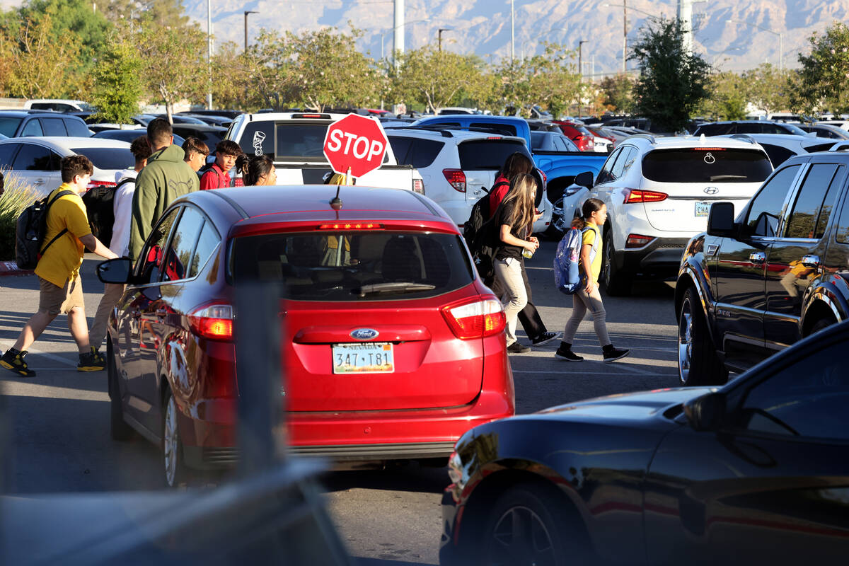 Students arrive for school at Somerset Academy’s Losee campus in North Las Vegas on Monday, O ...
