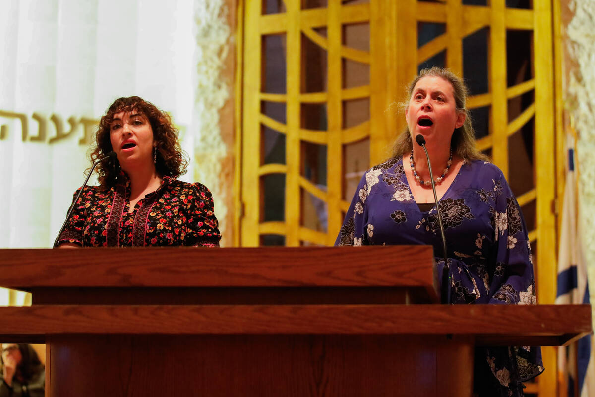 Heather Klein, left, and Raquel Gershon lead Jewish Nevadans in Hatikvah to show support for Is ...