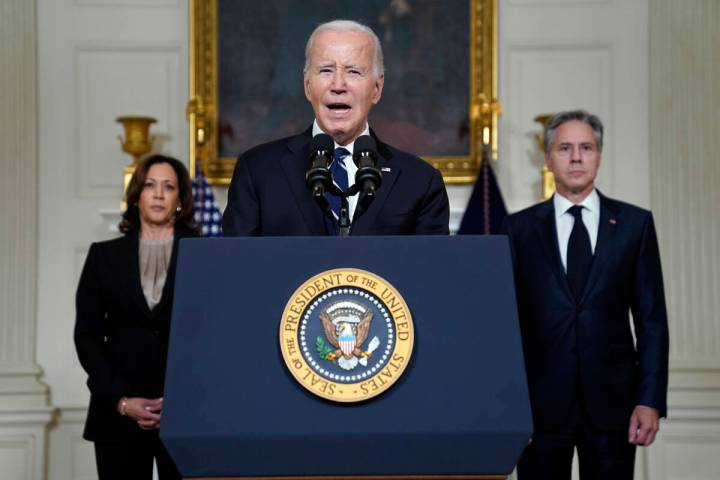 President Joe Biden speaks Tuesday, Oct. 10, 2023, in the State Dining Room of the White House ...