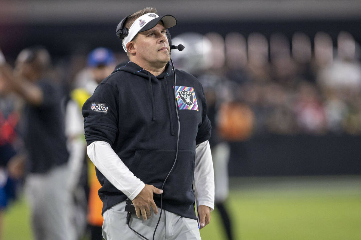 Raiders head coach Josh McDaniels looks on from the sideline during the second half an NFL game ...