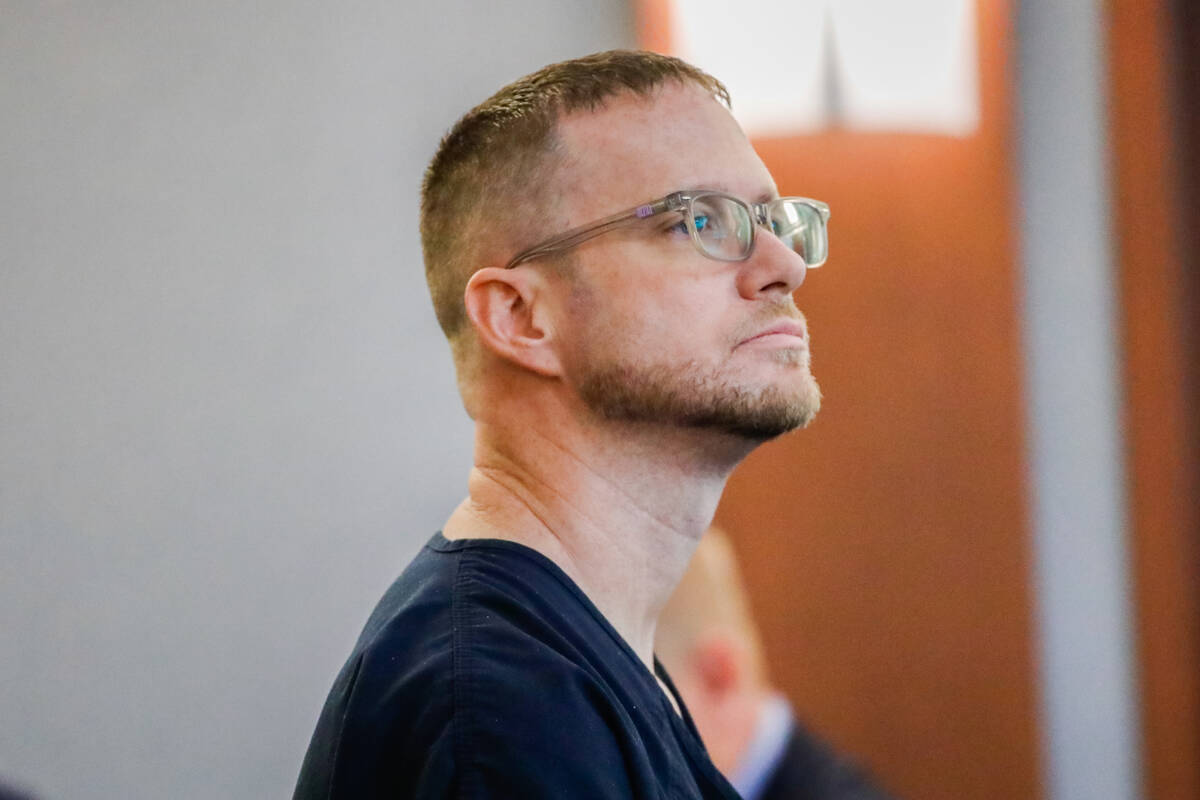 Patrick Byrom stands during a court hearing at the Regional Justice Center on Tuesday, Oct. 10, ...