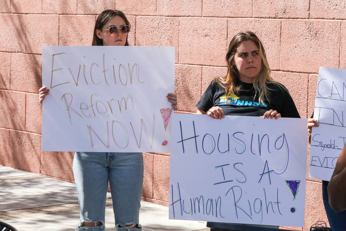 Activists and community members gather together in support of tenant rights during a press conf ...