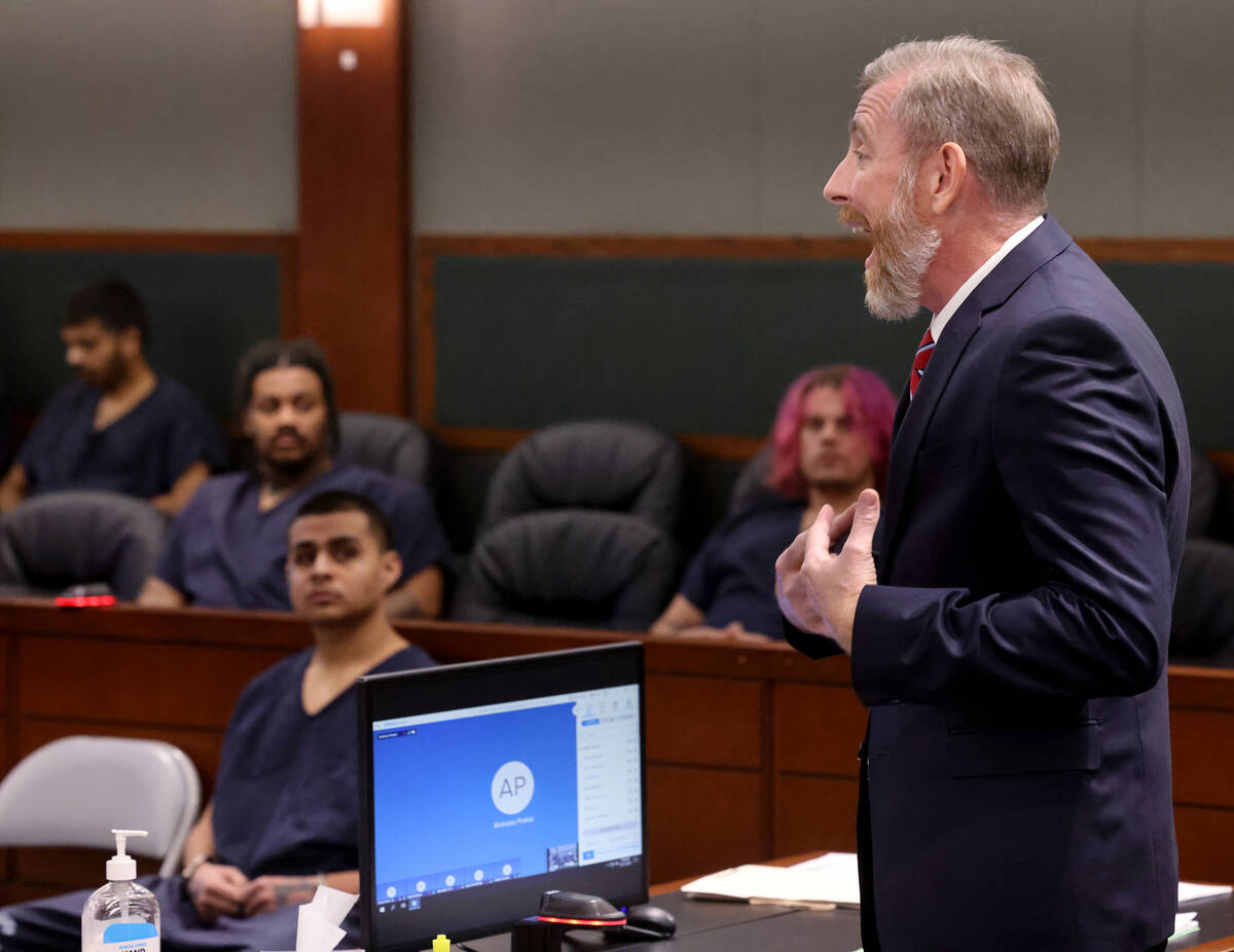 Defense attorney David Westbrook argues on behalf of his client Jesus Ayala, 18, seated lower l ...