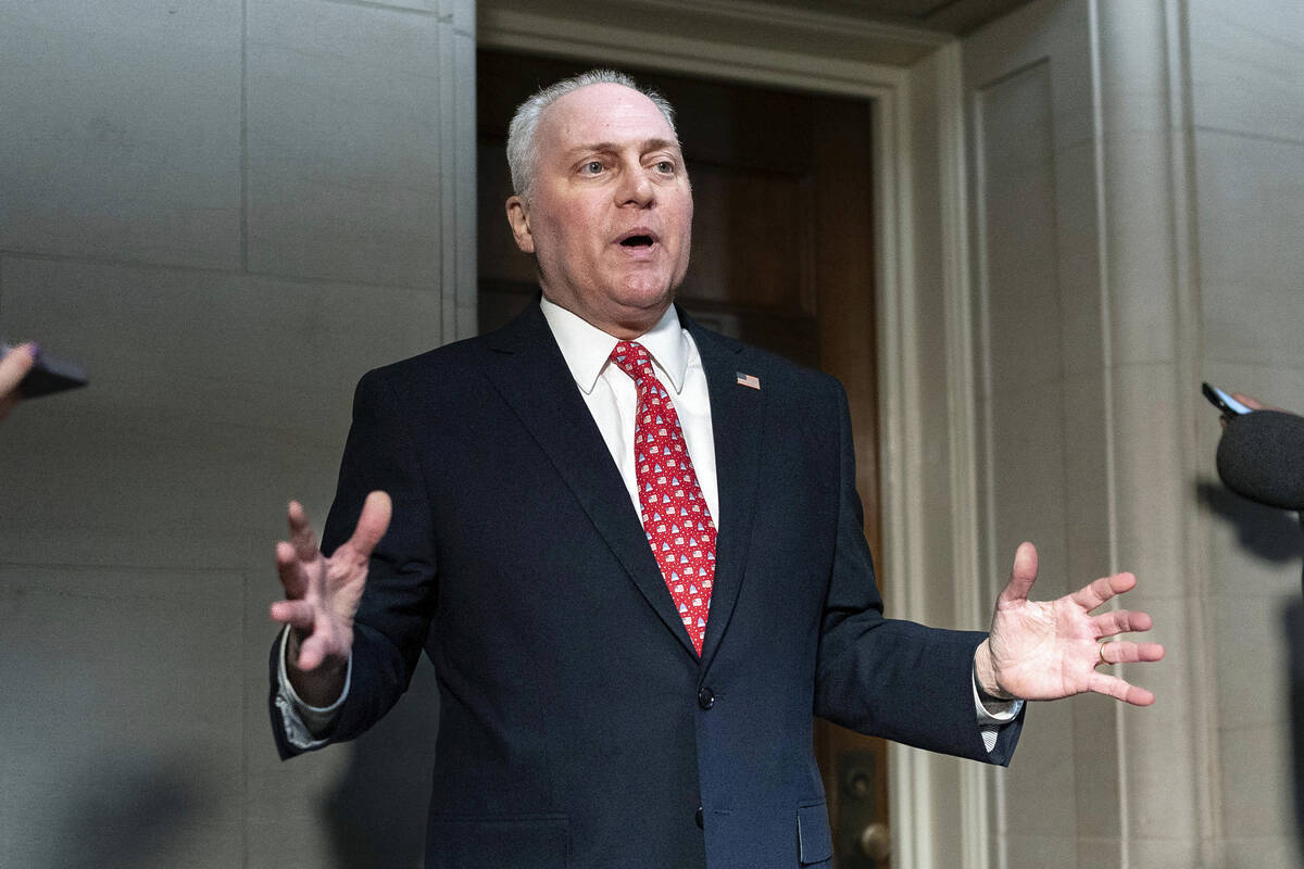 House Majority Leader Steve Scalise, R-La., talks to reporters as he leaves Republicans closed- ...