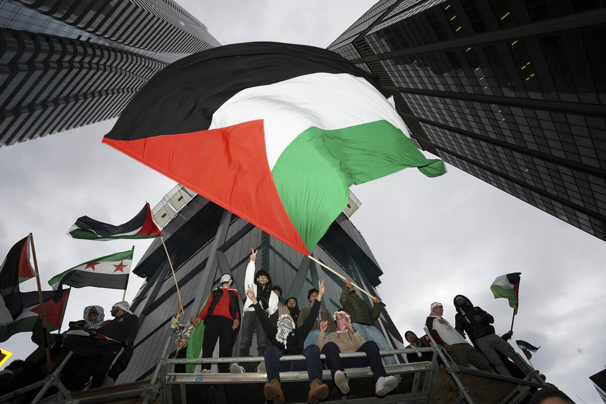 Supporters wave the Palestine flag at a march in Toronto, on Oct. 9, 2023. Before it transforme ...