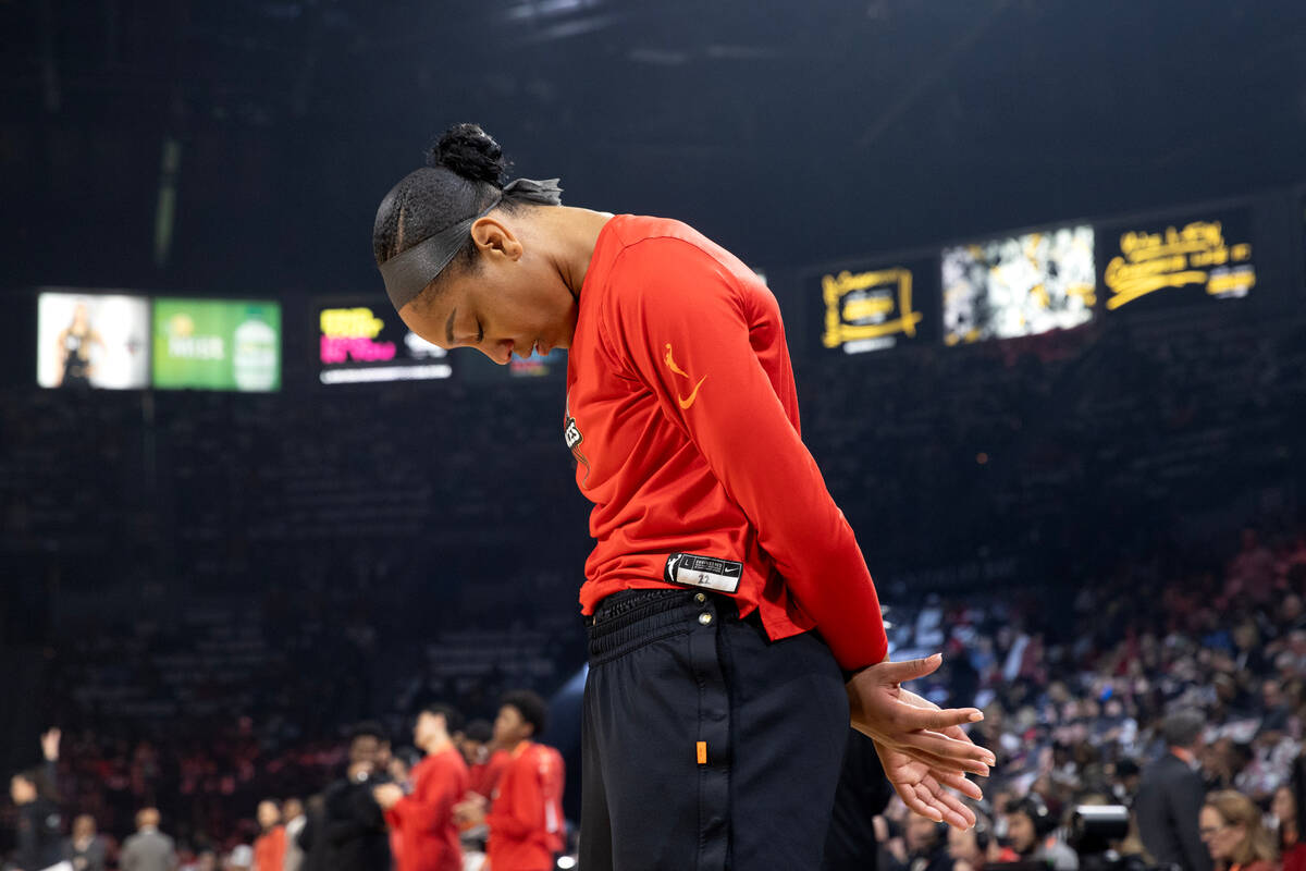 Las Vegas Aces forward A'ja Wilson (22) prays before Game 2 of a WNBA basketball final series a ...