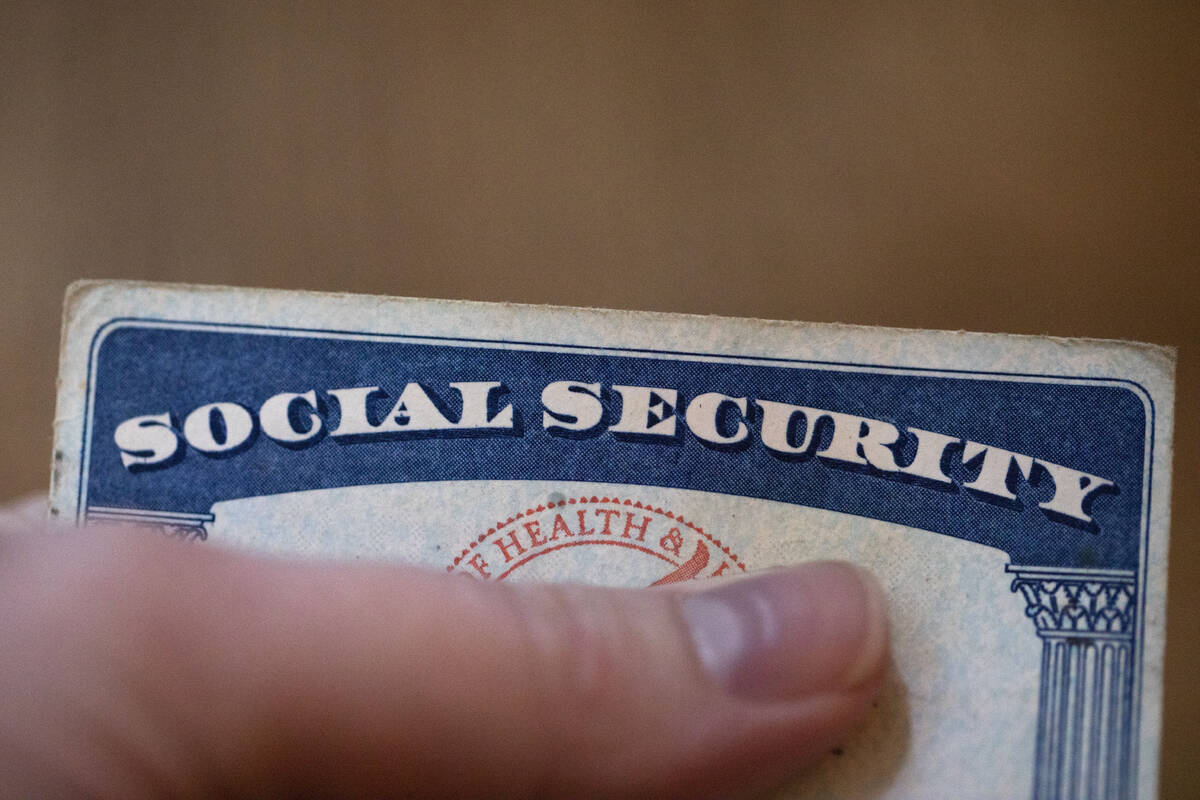 FILE - A Social Security card is displayed on Oct. 12, 2021, in Tigard, Ore. About 71 million ...