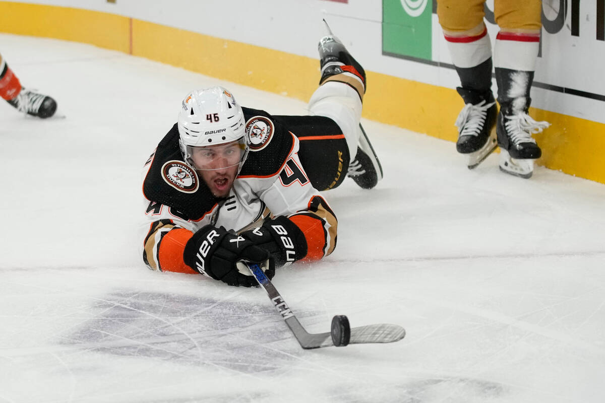 Anaheim Ducks defenseman Ilya Lyubushkin (46) slides across the ice towards the puck during the ...