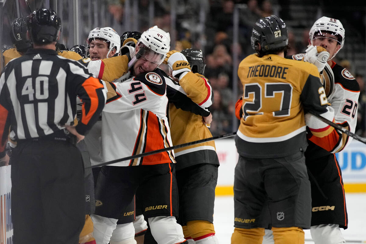 Vegas Golden Knights and Anaheim Ducks players fight during the first period of an NHL hockey g ...