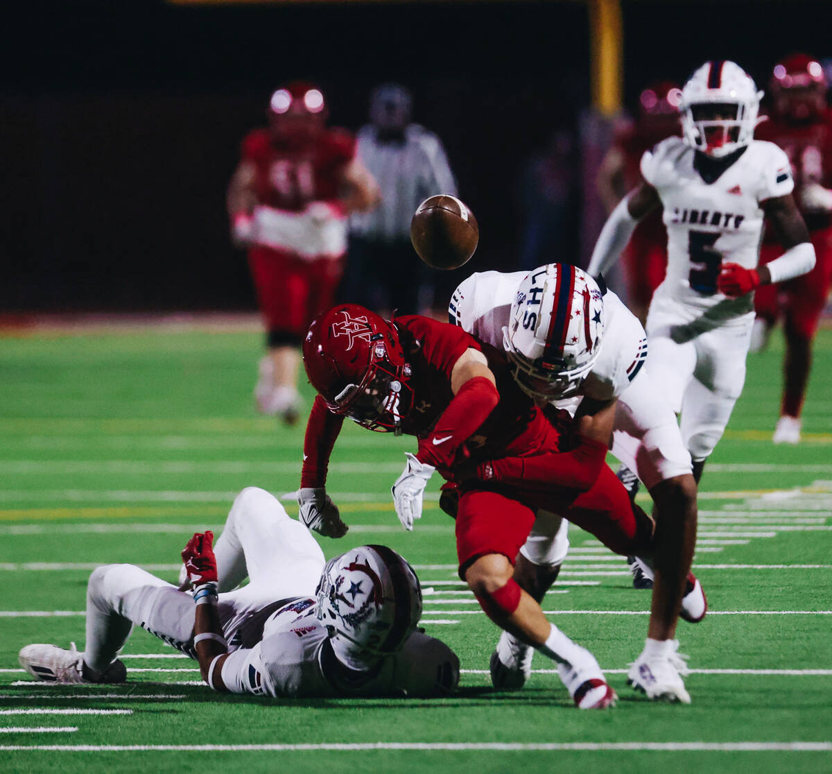 Arbor View wide receiver Jayden Williams (6) gets the ball knocked out of his hands as he’s t ...