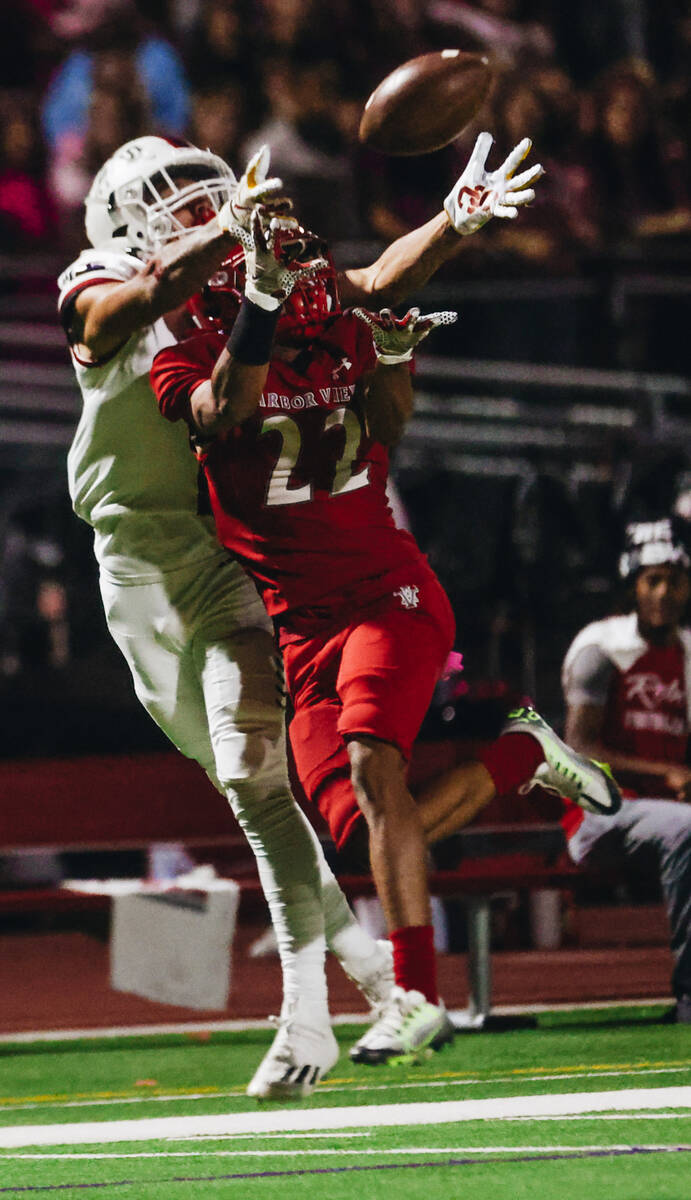 Arbor View cornerback Adrian Peterson (22) tries to intercept a pass meant for Liberty wide re ...