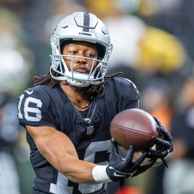 Raiders wide receiver Jakobi Meyers (16) reaches for a reception during warm ups before facing ...