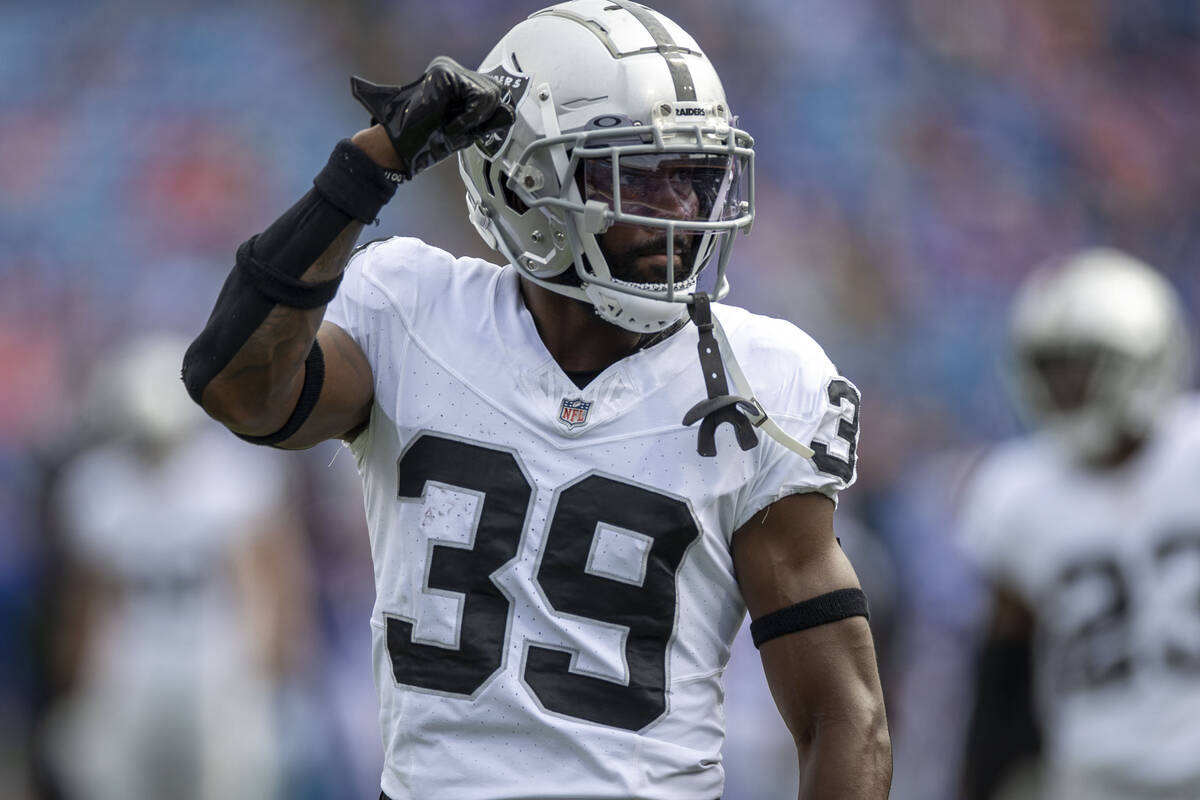 Raiders cornerback Nate Hobbs (39) fist pumps to the fans before an NFL game against the Buffal ...