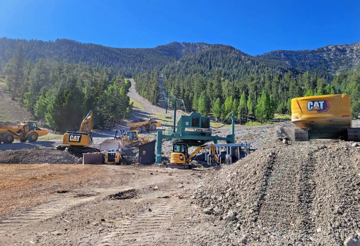 Heavy machinery is used at Lee Canyon to remove thousands of tons of debris from around a chair ...