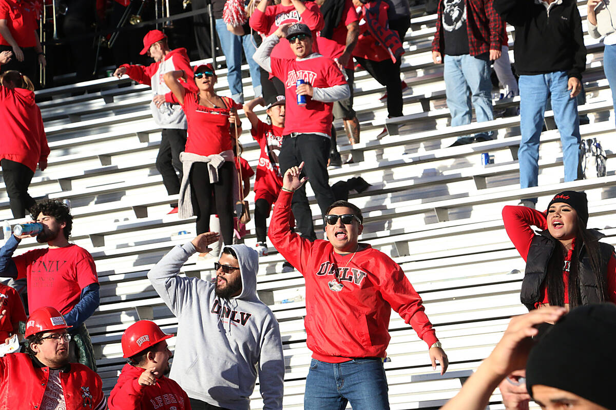 UNLV fans celebrate their victory over Nevada at Mackay Stadium in Reno on Oct. 14, 2023. (Jaso ...